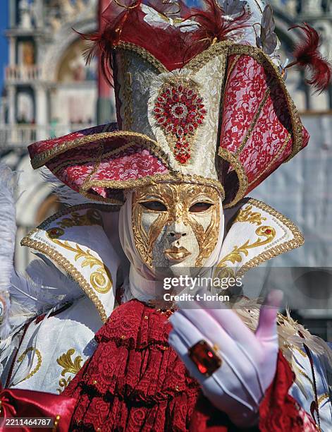 man sending a hand kiss - venice carnival. - venice carnival stock pictures, royalty-free photos & images