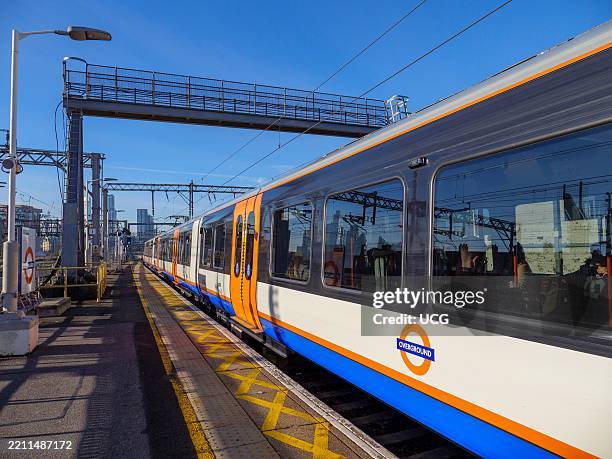 London Overground train at the station platform, London, UK.