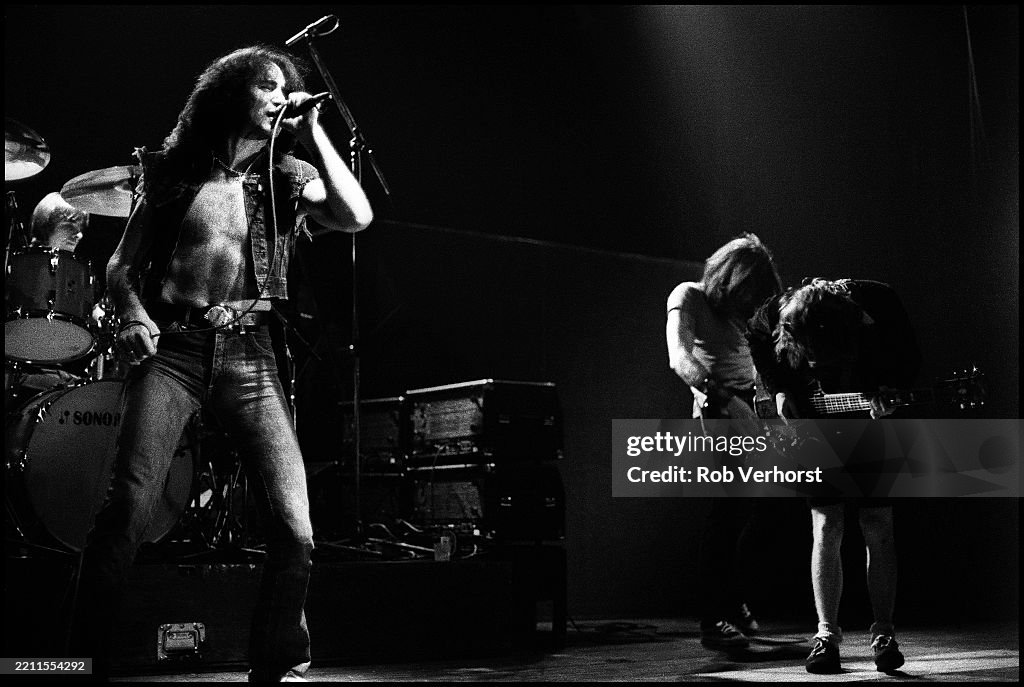 Angus Rudd Phil Rudd, Bon Scott, Cliff Williams, Angus Young perform live on ...