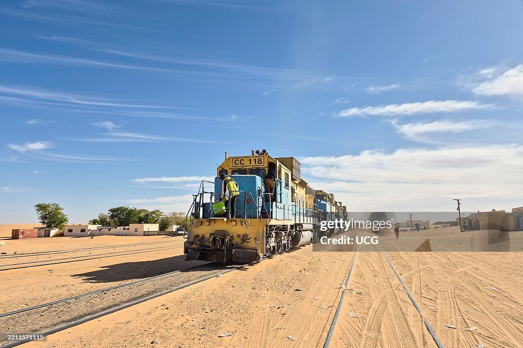 Mauritania, the longest train in the world transporting iron dust from the mines of Zouerat to the seaport of Nouadhibou (Surroundings of Tmemichat)