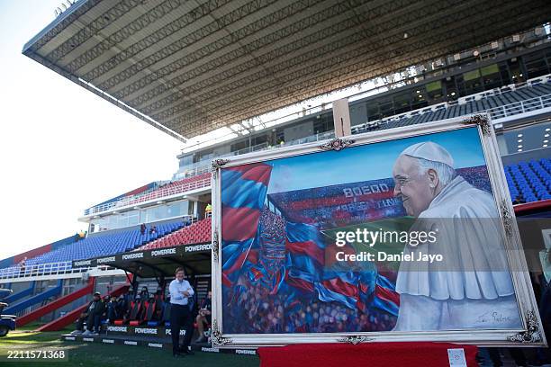Painting depicting Pope Francis and San Lorenzo stadium is displayed before a Torneo Apertura Betano 2025 Group B match between San Lorenzo and...