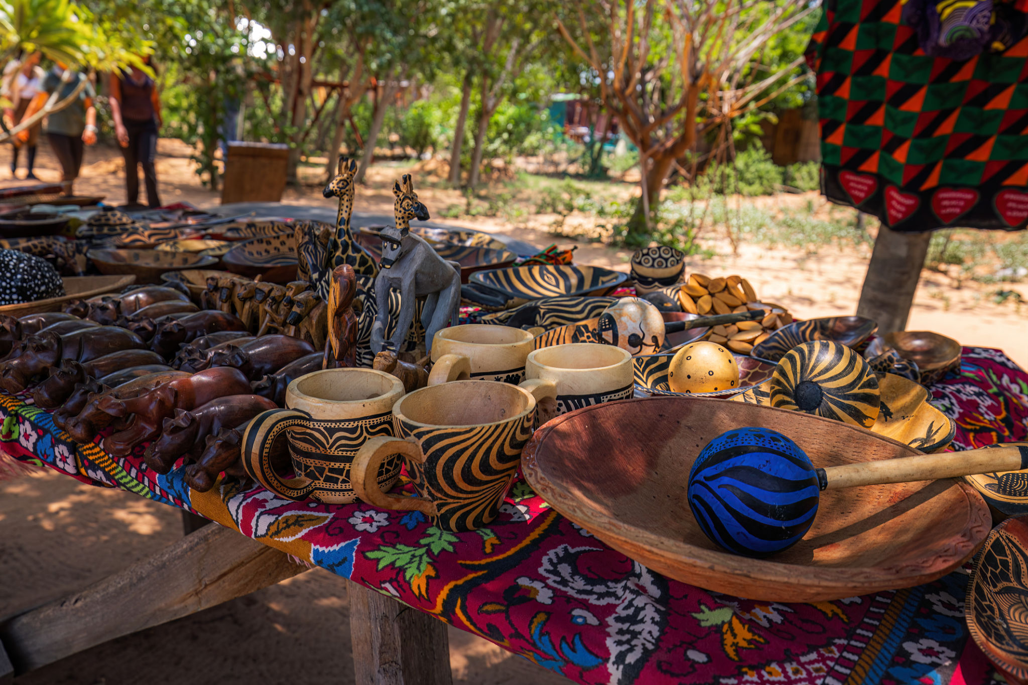 Vibrant African Market Display of Handcrafted Artifacts in Zambia Vibrant African Market Display of Handcrafted Artifacts in Zambia