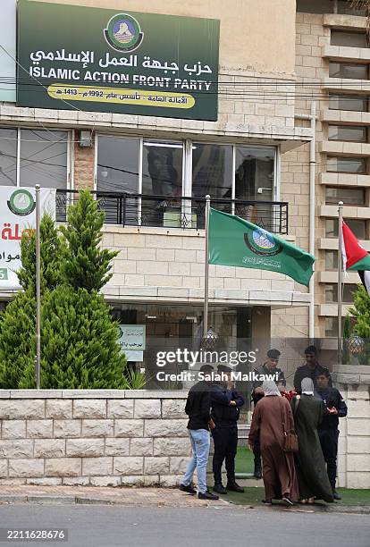 Female members of the parliament for the Muslim Brotherhood Dima Tahboub and Reem Abu Ghosh arrive at their office as Jordanian police close the...