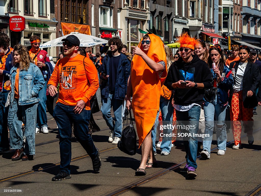 A man seen wearing a carrot's costume...