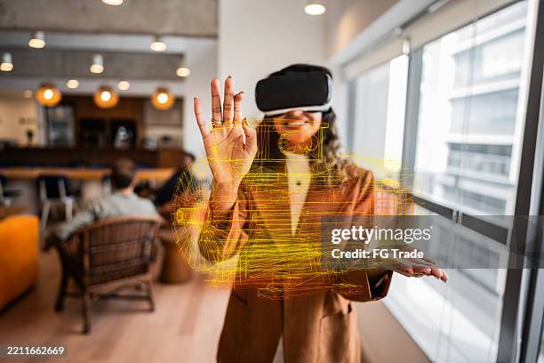 engineer using virtual reality to design 3d engine prototype - engine blueprint stock pictures, royalty-free photos & images
