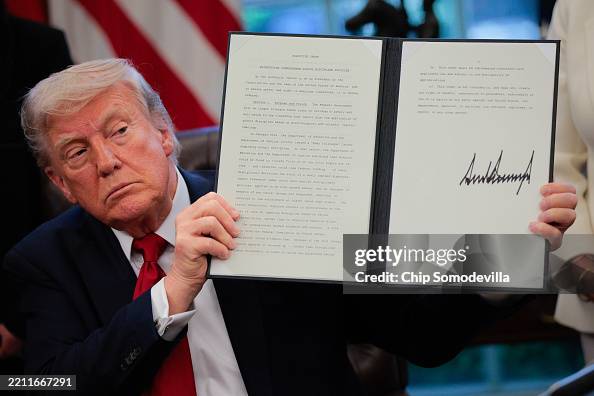 President Trump Signs Executive Orders In The Oval Office President Trump Signs Executive Orders In The Oval Office