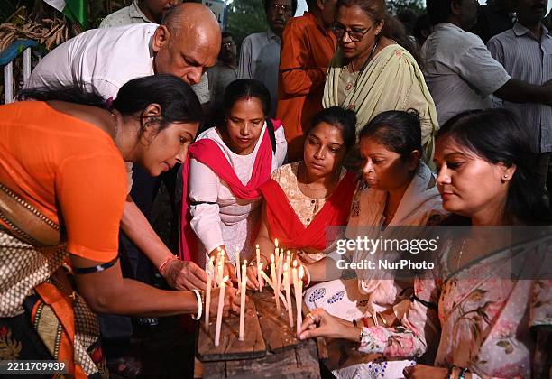 Women protest with candlelight against the deadly attack on tourists in the Pahalgam region of Indian-administered Kashmir, as seen in Kolkata,...
