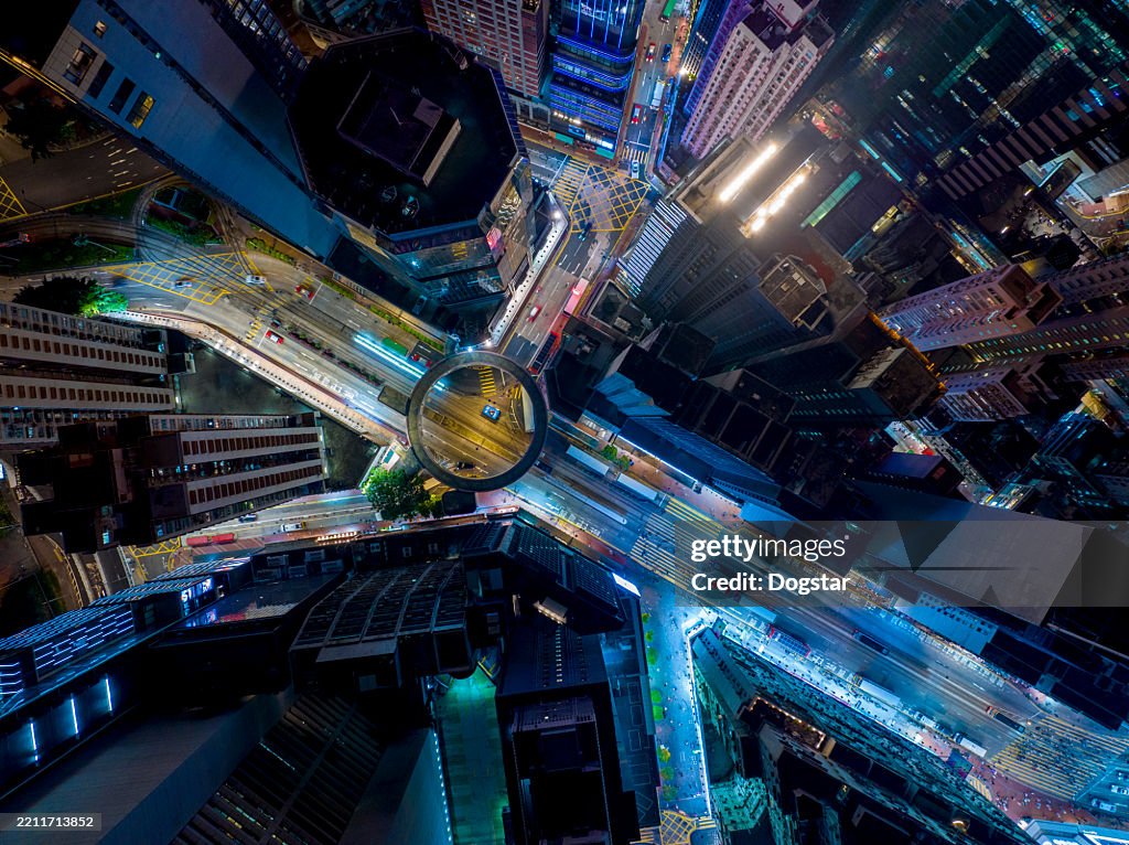 Hong Kong Busy Streets Alive With Lights And Color at Night. Urban Nightlife Traffic.