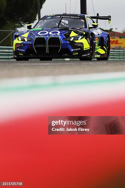 The Team WRT BMW M4 LMGT3 of Ahmad Al Harthy, Valentino Rossi and Kelvin Van Der Linde drives at Autodromo Enzo e Dino Ferrari on April 20, 2025 in...