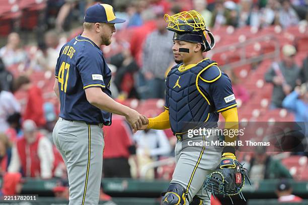 William Contreras and Jared Koenig of the Milwaukee Brewers celebrate after defeating the St. Louis Cardinals 7/1 at Busch Stadium on April 27, 2025...