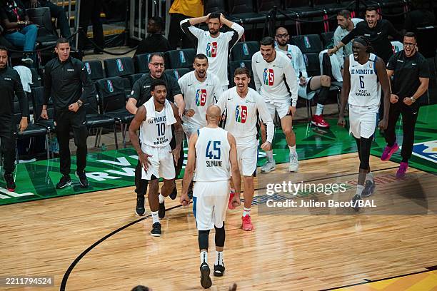 The US Monastir bench celebrates during the game against Petro de Luanda during the Sahara Conference Group on April 27, 2025 at Dakar Arena in...