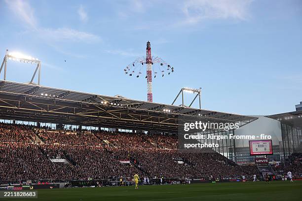 St.Pauli Millerntor stadium in the background a carousel from the Dom fairground next to the stadium during the Bundesliga match between FC St. Pauli...