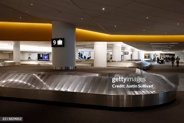 Baggage carousels sit empty at San Francisco International Airport on April 24, 2025 in San Francisco, California. Southwest and American Airlines...