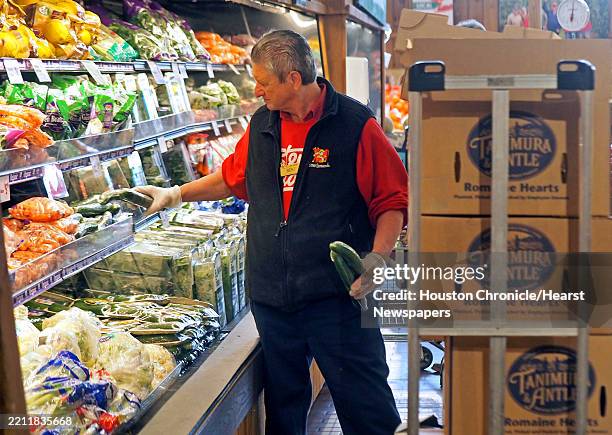 Stew Leonard's Bert Kocsis replenishes vegetables at the grocery store in Norwalk, Conn., on Friday April 11, 2025.
