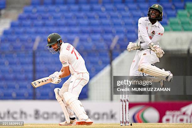 Bangladesh's wicketkeeper Jaker Ali celebrates after the dismissal of the Zimbabwe's captain Craig Ervine during the first day of the second Test...