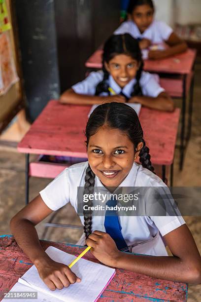 sri lankan school children in classroom - developing countries stock pictures, royalty-free photos & images