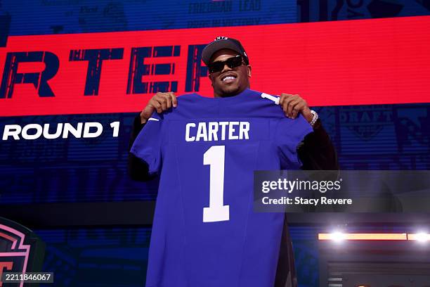 Edge Rusher Abdul Carter of Penn State poses after being selected third overall pick by the New York Giants during the first round of the 2025 NFL...