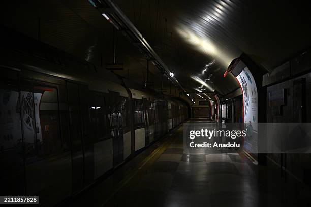 View shows a dark metro station in Madrid during a widespread power outage that struck Spain and Portugal around midday on Monday, with the cause...