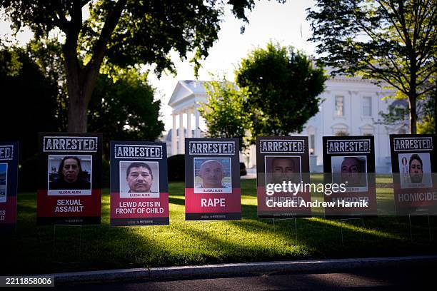 Posters depicting detained illegal immigrants are visible along the north lawn outside the West Wing of the White House on April 28, 2025 in...