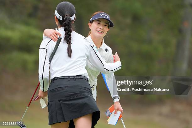 Kanako Aoki and Mei Fukuda of Japan embrace after holing out on the 18th green during the second round of DAIO KAIUN LADIES OPEN at Elleair Golf Club...