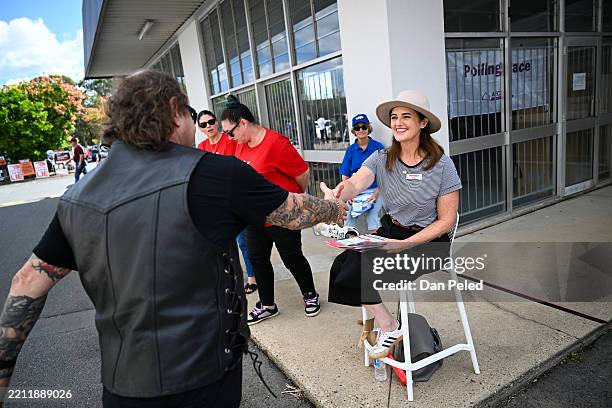Labor's candidate for the seat of Dickson, Ali France, greets voters at an early voting centre on April 23, 2025 in the suburb of Strathpine in...