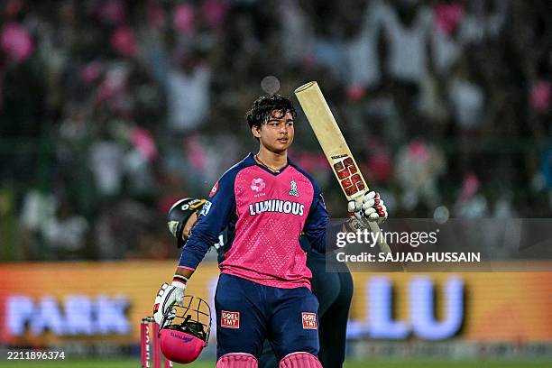 Rajasthan Royals' Vaibhav Suryavanshi celebrates after scoring a century during the Indian Premier League Twenty20 cricket match between Rajasthan...