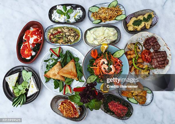 typical greek (raki) table - griechische küche stock-fotos und bilder