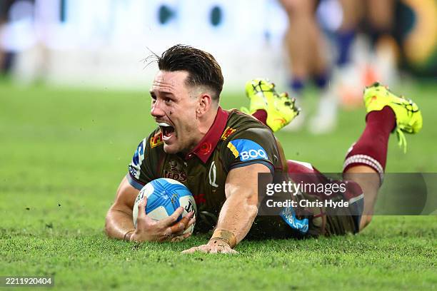 Lachie Anderson of the Reds scores a try during the round 11 Super Rugby Pacific match between Queensland Reds and Blues at Suncorp Stadium, on April...