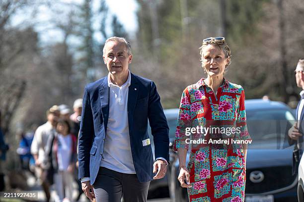 Canadian Prime Minister Mark Carney and his wife, Diana Fox Carney, arrive to cast their vote on Election Day on April 28, 2025 in Ottawa, Canada....