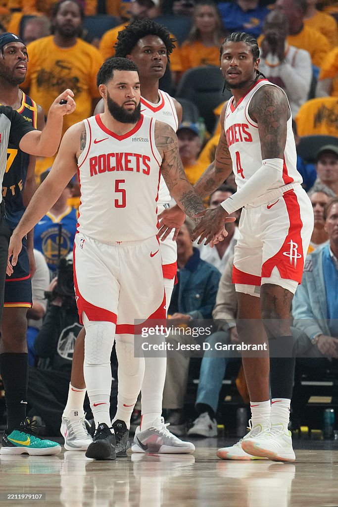 Number 5 Rockets Fred VanVleet and Jalen Green of the Houston Rockets high five during ...