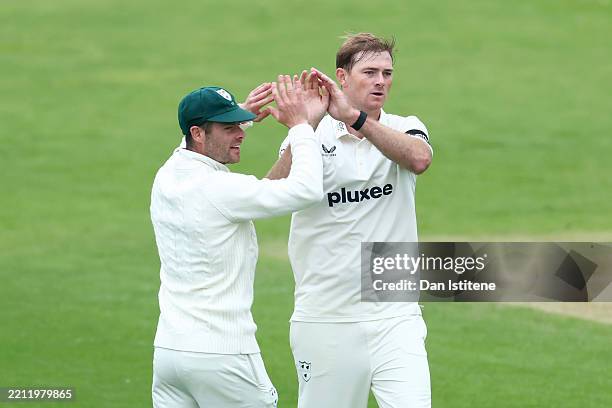 Tom Taylor of Worcestershire celebrates taking the wicket of Ben McKinney of Durham during the Rothesay County Championship match between...