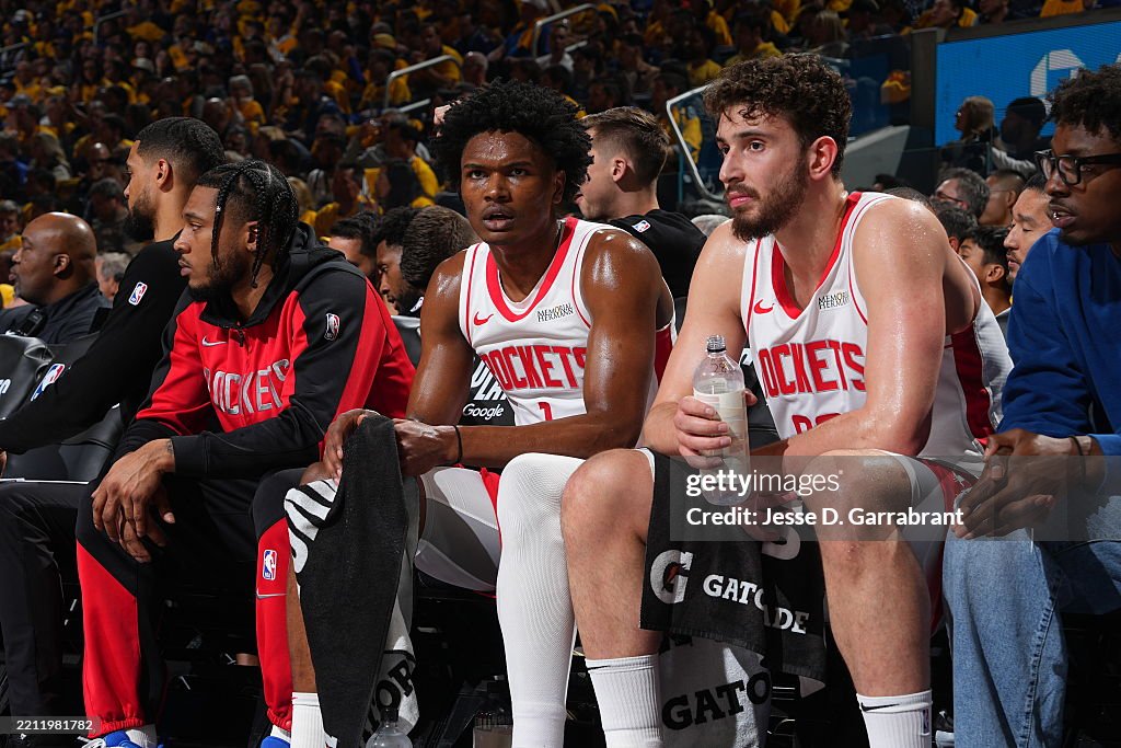 Houston Rockets Thompson Amen Thompson and Alperen Sengun of the Houston Rockets look on... News ...