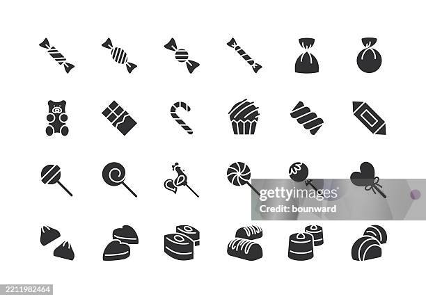 ilustraciones, imágenes clip art, dibujos animados e iconos de stock de iconos negros planos de dulces y caramelos. vector - envoltorio de dulce