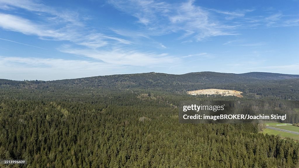 Extensive forest landscape under a clear sky with rolling hills, Tröstau, Fichtelgebirge, Bavaria, Germany, Europe