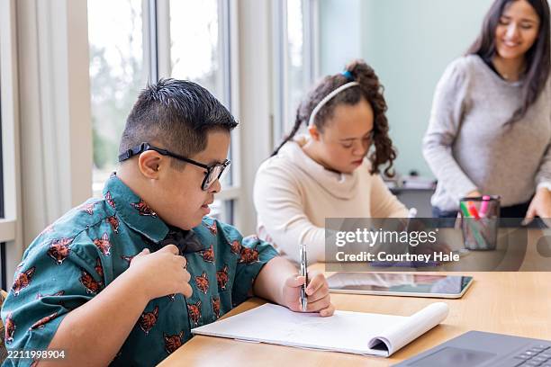 supportive learning for students with disabilities - advocacy stock pictures, royalty-free photos & images