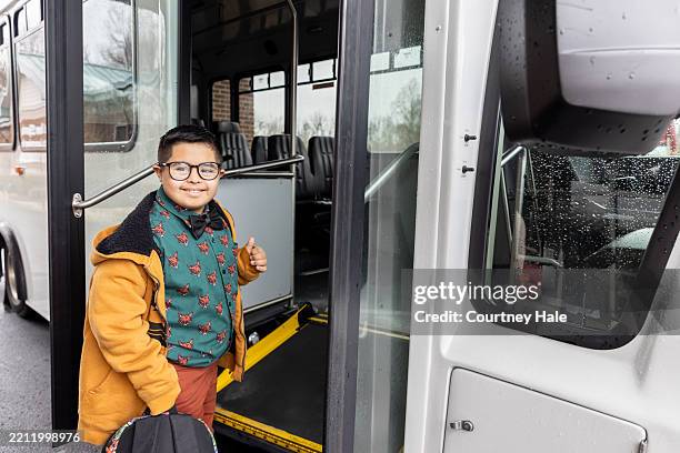confident student using accessible transportation - shuttle service stock pictures, royalty-free photos & images
