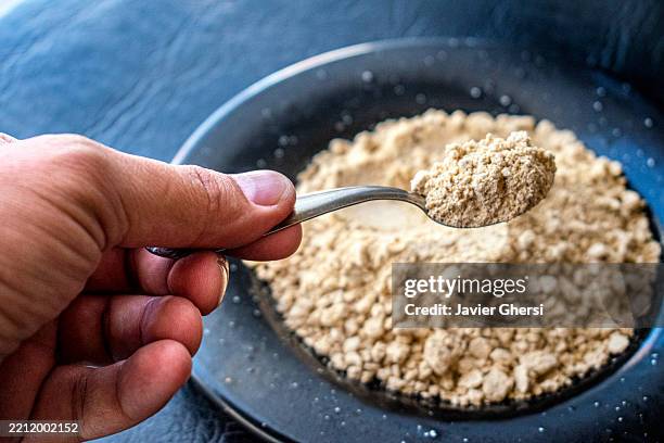 maca powder. peruvian maca. andean ginseng. dietary supplement. lepidium meyenii. - potion stock pictures, royalty-free photos & images