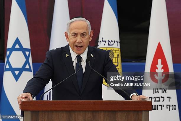 Israeli Prime Minister Benjamin Netanyahu speaks during the annual ceremony at the eve of Israel's Remembrance Day for fallen soldiers at the Yad...
