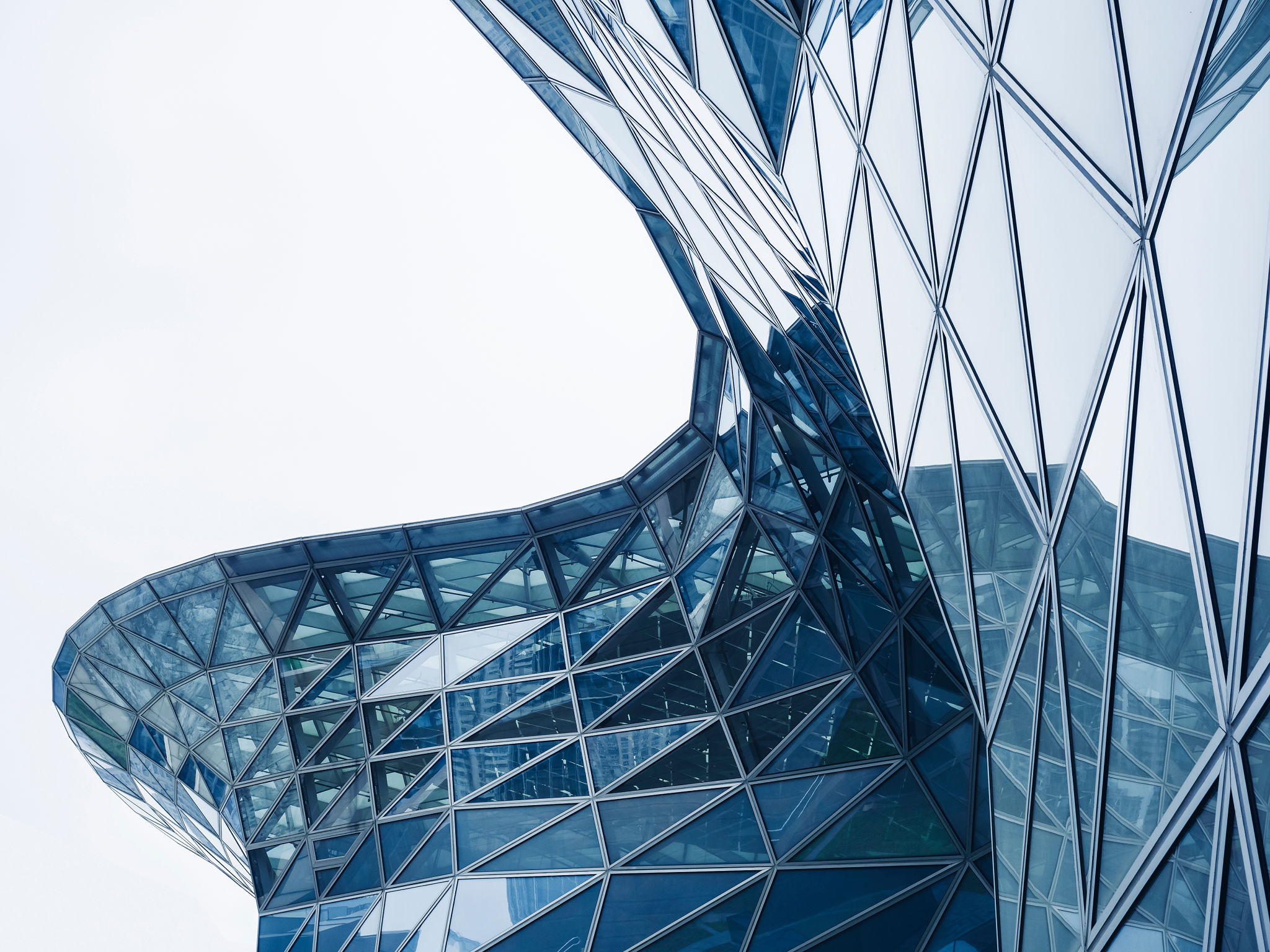 Steel curve Glass facade Modern building blue reflection Architecture details Steel curve Glass facade Modern building blue reflection Architecture details