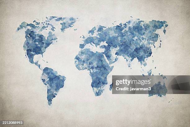 Grunge world map on vintage paper background in watercolour style.