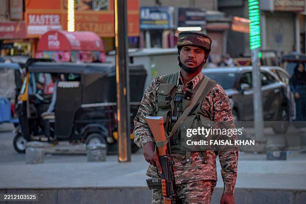 An Indian paramilitary soldier keeps patrols in Srinagar, Kashmir on April 29 as India shuts tourist destination following the recent attack....