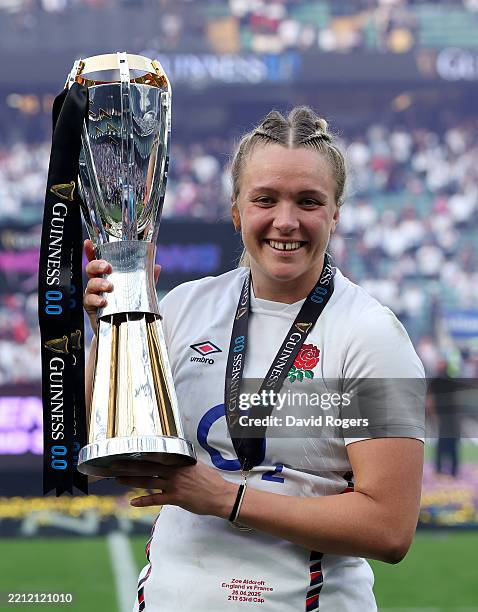 Zoe Aldcroft of England poses for a photograph with the Guinness Women’s Six Nations trophy, after England defeated France to secure a Grand Slam and...