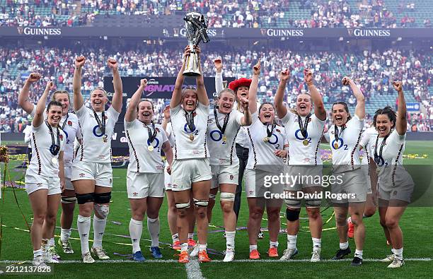 Zoe Aldcroft the England captain, lifts the Guinness Women’s Six Nations trophy, after England defeated France to secure a Grand Slam and be crowned...