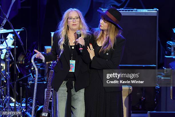 Christina Applegate speaks onstage during the Light Up The Blues 7 Concert celebrating Autism Speaks' 20th Anniversary at the Greek Theatre on April...