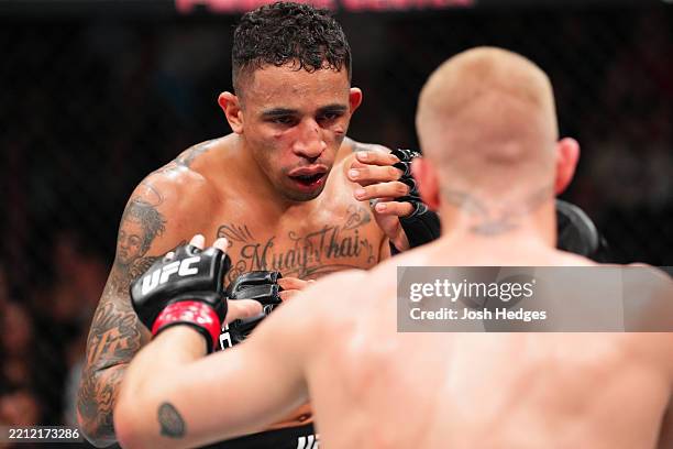 Carlos Prates of Brazil faces Ian Machado Garry of Ireland in a welterweight fight during the UFC Fight Night event at T-Mobile Center on April 26,...