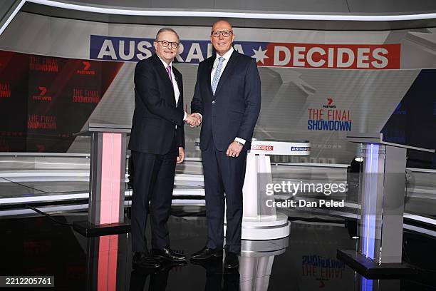 Australian Prime Minister Anthony Albanese shakes hands with Opposition Leader Peter Dutton during the fourth and final leaders' debate hosted at...