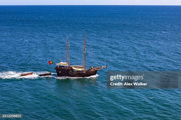 caravel (caravela) portuguese sailing tall ship on a calm atlantic ocean. - caravel stock pictures, royalty-free photos & images