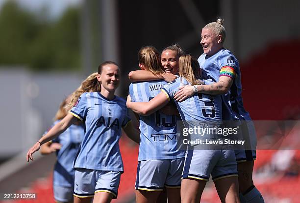 Clare Hunt of Tottenham Hotspur celebrates scoring her team's second goal with teammates during the Barclays Women's Super League match between...