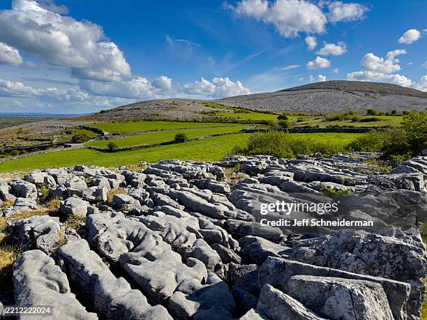 burren karst pavement and stone walls, ireland - limestone stock pictures, royalty-free photos & images