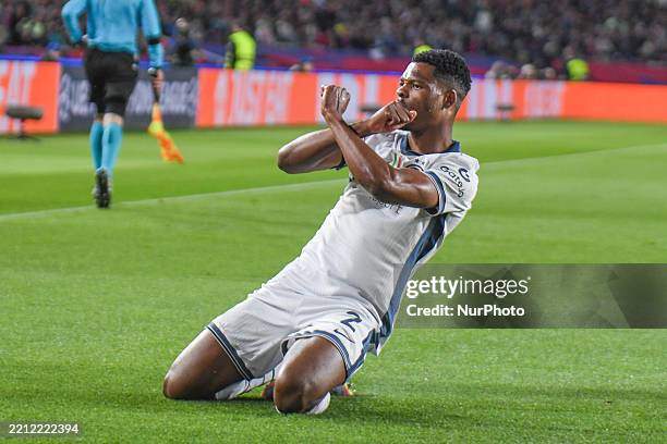 Dumfries of Inter celebrates scoring for the team during Round 1 of the Semifinal, UEFA Champions League 24/25, at Stadio Olimpico Lluis Companys in...
